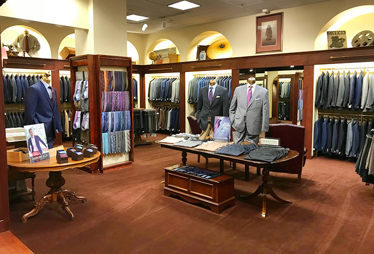 Interior of Anderson & Co. store showing suits